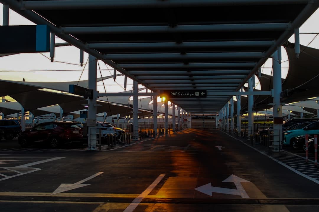 A view of an empty parking lot at sunset — Photo by angela victorio on Unsplash